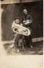 Two men with cornet #574D2F